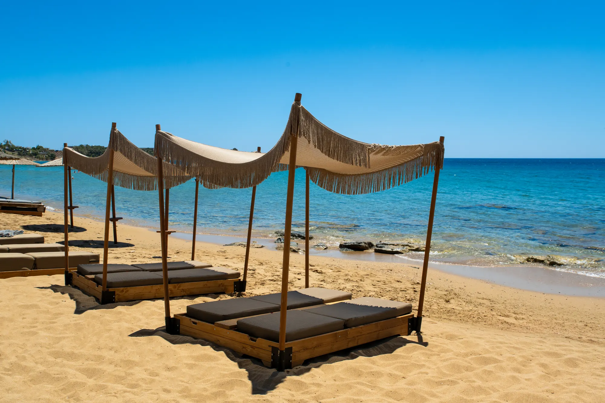 Premium beach cabanas on the sand at Parea Sea Side