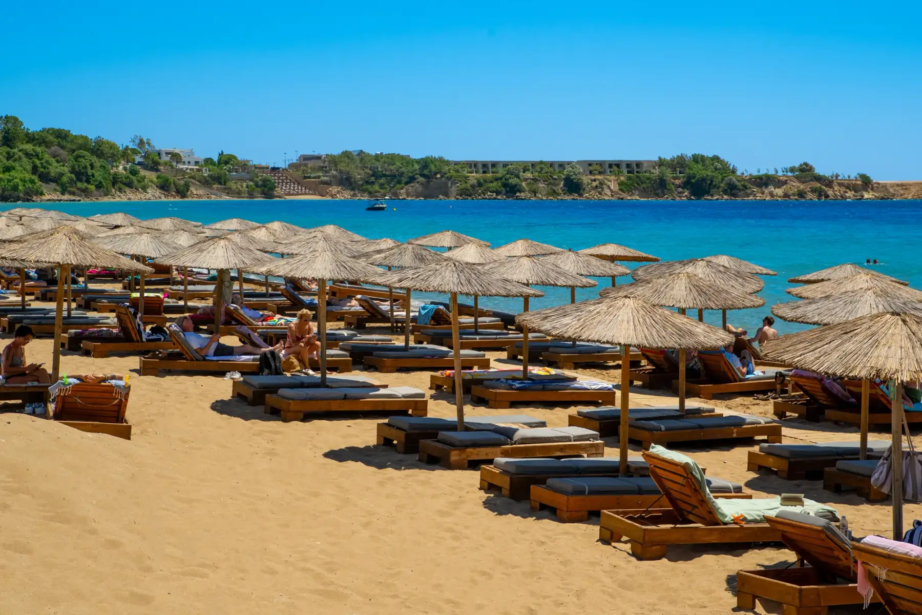 Sunbeds and umbrellas on the beach at Parea Sea Side